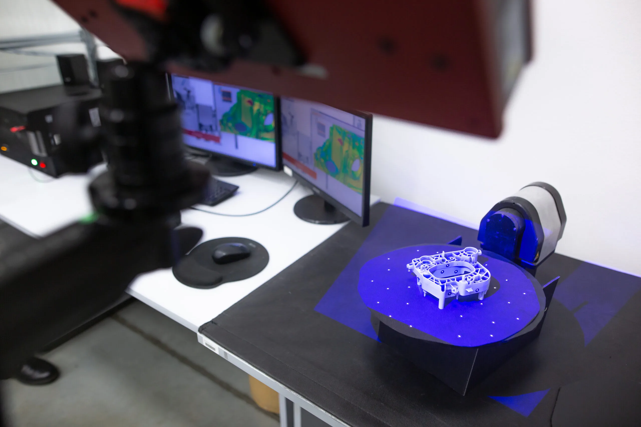 A small detailed component being inspected using non-contact inspection services (3D Scanning).