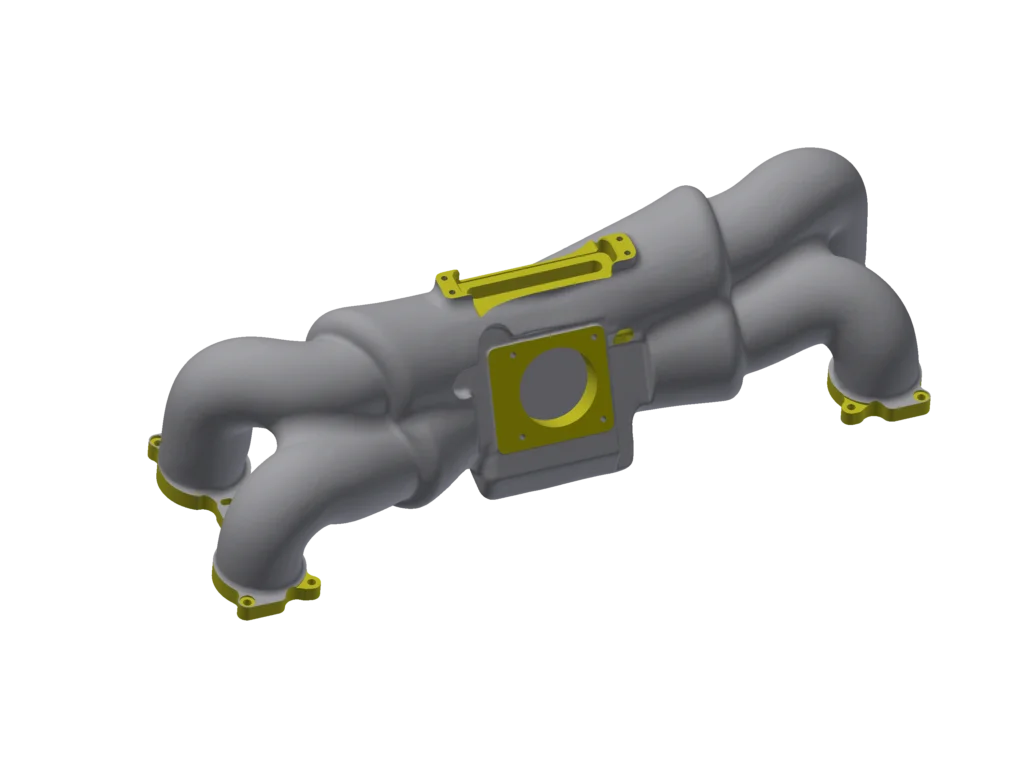 Grey model of the engine manifold with yellow highlights on the machined surfaces.