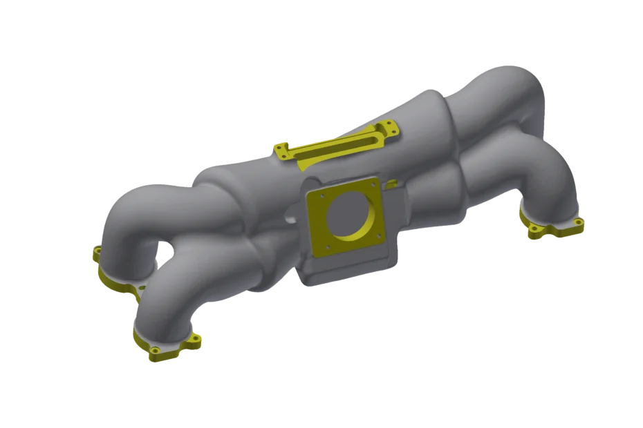 Grey model of an engine manifold with yellow highlights on the machined surfaces.